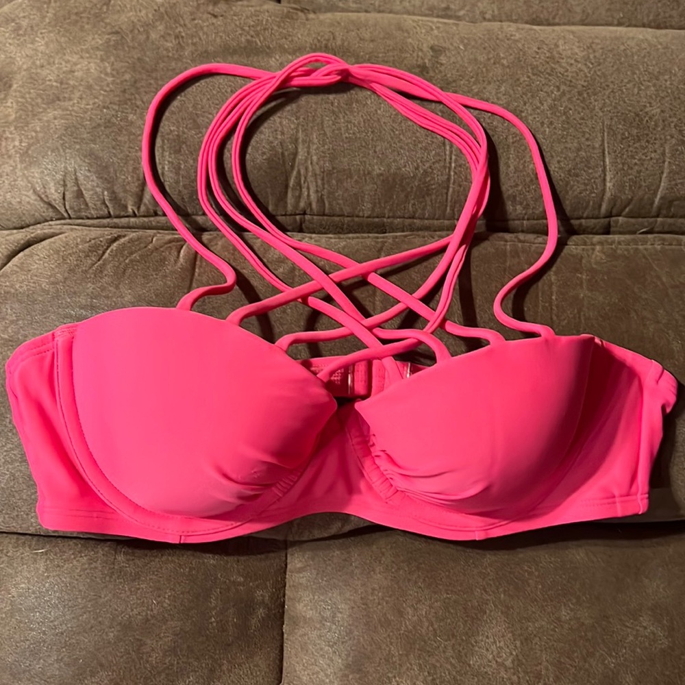Aerie 34B swim top in pink. Crisscross detail on chest. Molded cups
